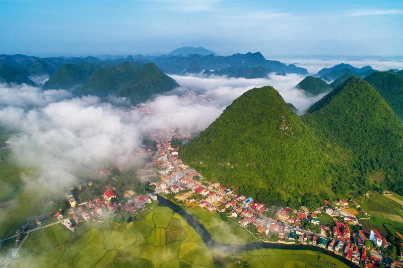 Limestone peaks rising around the flat, farmed floor of the Bắc Sơn valley